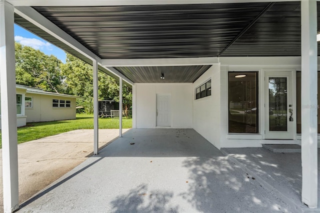 view of patio featuring a carport