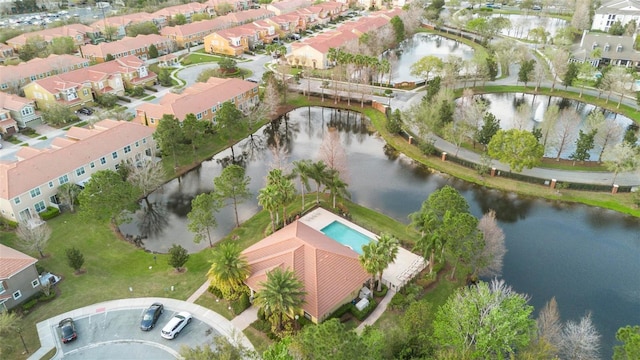 aerial view featuring a residential view and a water view