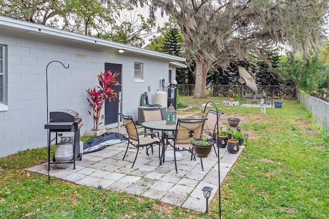 view of patio / terrace featuring grilling area and a fenced backyard