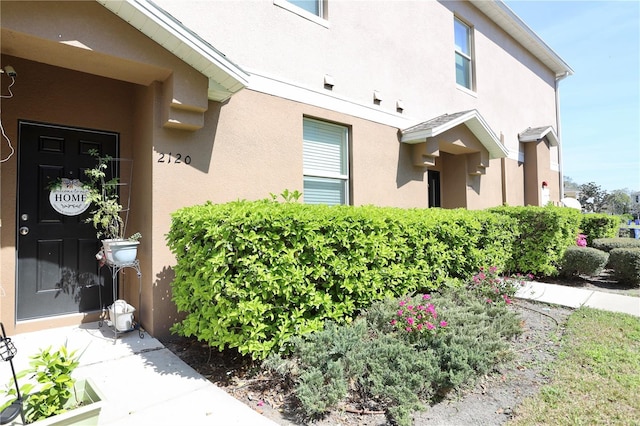 exterior space with stucco siding