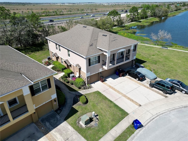 drone / aerial view featuring a water view