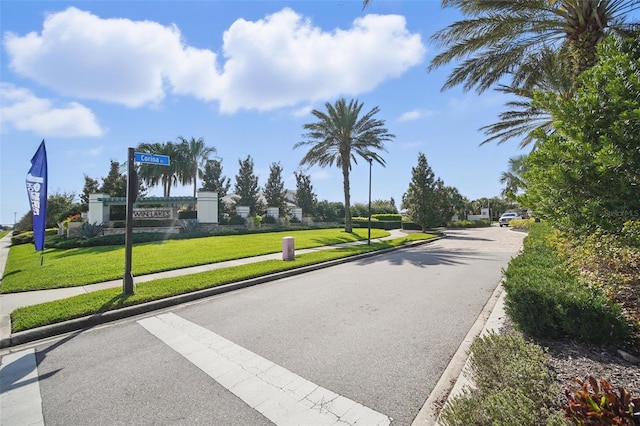 view of road featuring sidewalks and curbs