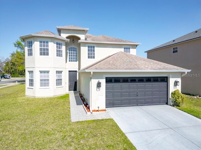 traditional home featuring a garage, driveway, a shingled roof, and a front lawn