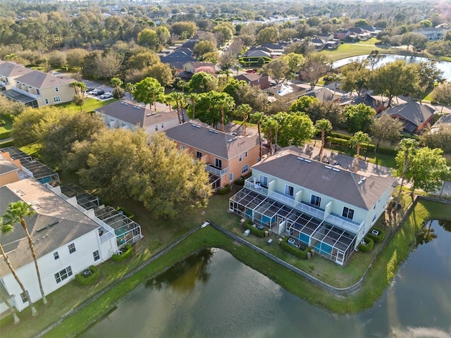 aerial view with a residential view and a water view