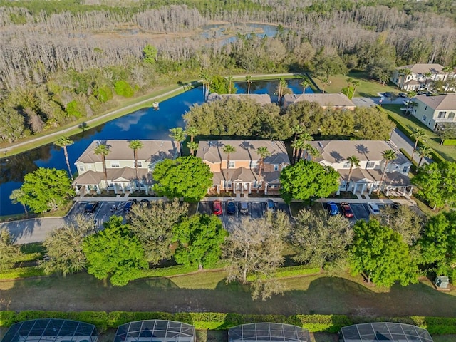 bird's eye view with a residential view and a water view