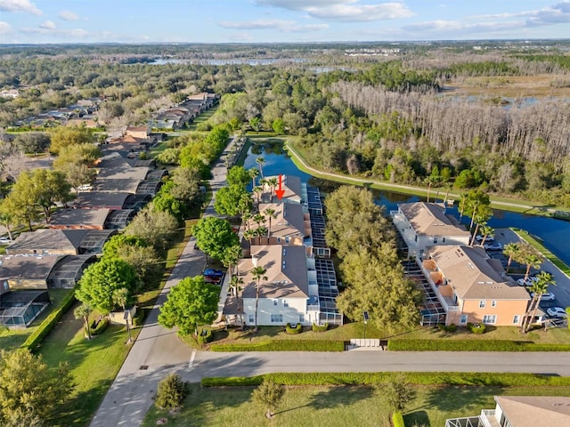 birds eye view of property with a residential view and a water view