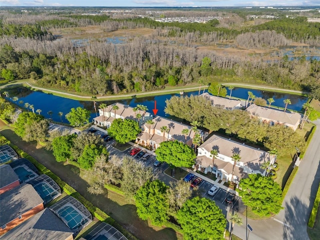 birds eye view of property with a residential view and a water view