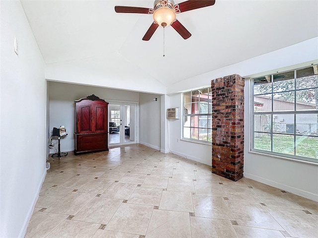 foyer entrance featuring lofted ceiling, french doors, baseboards, and light tile patterned floors