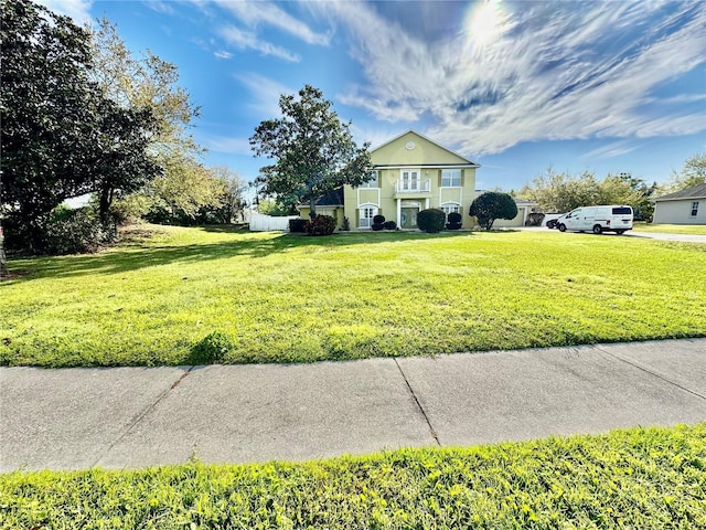 view of front of home with a front yard