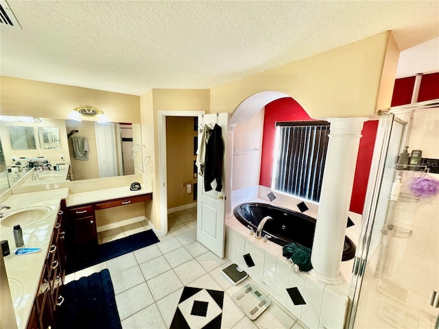 full bath featuring visible vents, a tub with jets, a shower stall, tile patterned flooring, and vanity