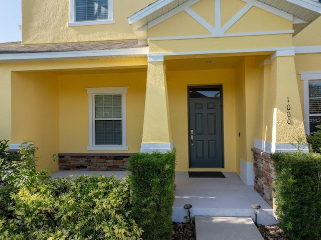 1000 Seburn Rd, Apopka, FL 32703 - entrance to property featuring stucco siding and stone siding