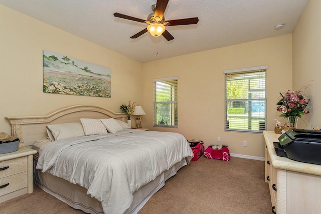 1000 Seburn Rd, Apopka, FL 32703 - bedroom with light carpet, a ceiling fan, and baseboards