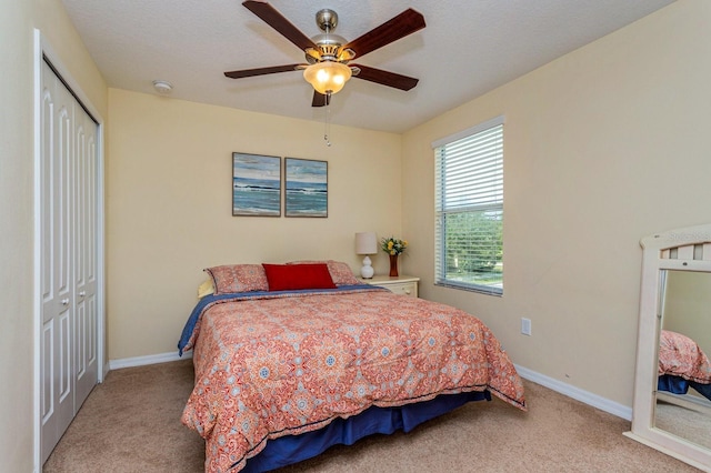 1000 Seburn Rd, Apopka, FL 32703 - carpeted bedroom with a closet, baseboards, and a ceiling fan