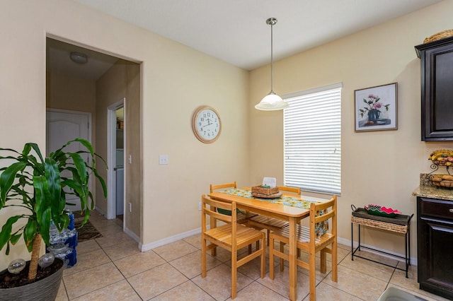 1000 Seburn Rd, Apopka, FL 32703 - dining space featuring light tile patterned flooring and baseboards