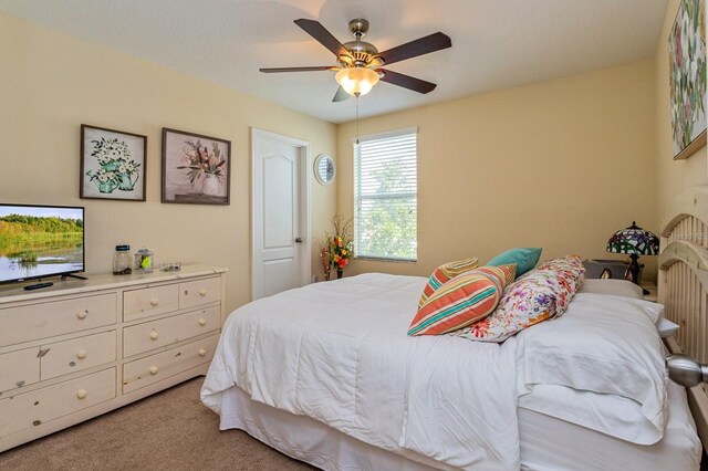 1000 Seburn Rd, Apopka, FL 32703 - bedroom with light carpet and ceiling fan