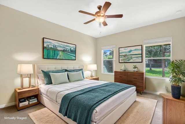 1000 Seburn Rd, Apopka, FL 32703 - bedroom with light carpet, multiple windows, and a ceiling fan