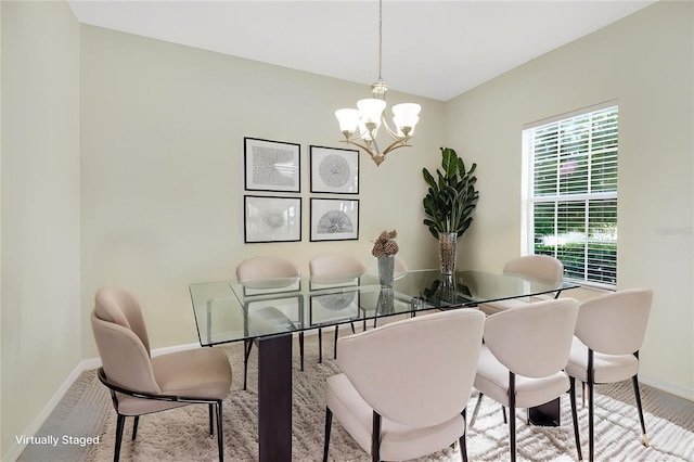 1000 Seburn Rd, Apopka, FL 32703 - carpeted dining area featuring baseboards and a chandelier