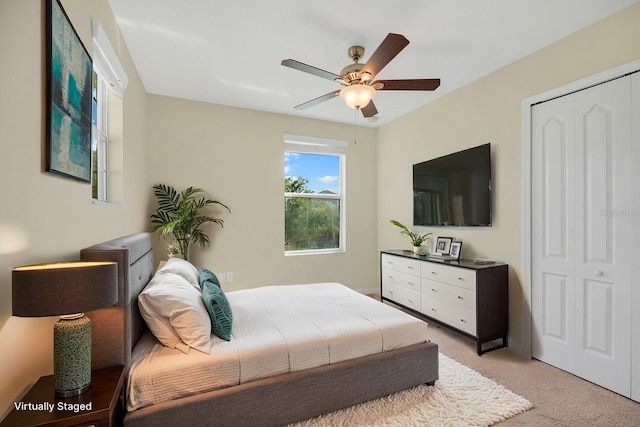 1000 Seburn Rd, Apopka, FL 32703 - bedroom featuring light carpet, a closet, and ceiling fan