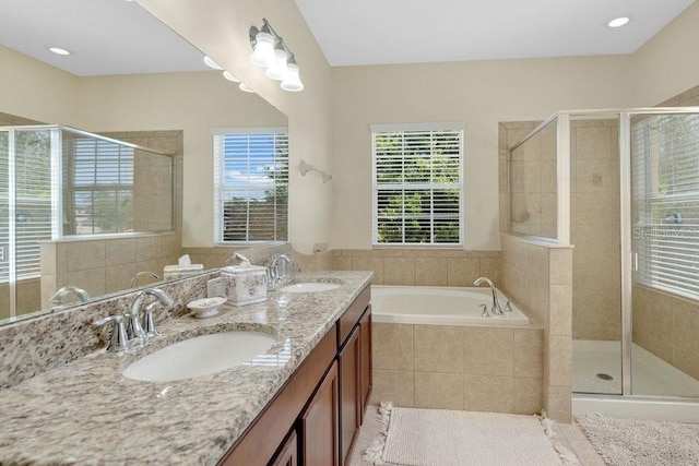 1000 Seburn Rd, Apopka, FL 32703 - bathroom with a bath, double vanity, and a shower stall