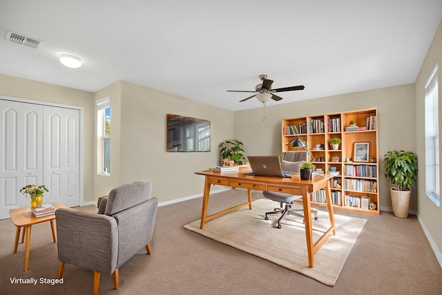 1000 Seburn Rd, Apopka, FL 32703 - carpeted home office with baseboards and ceiling fan