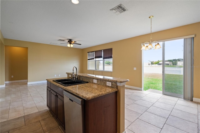 kitchen with dishwasher, a sink, visible vents, and a healthy amount of sunlight