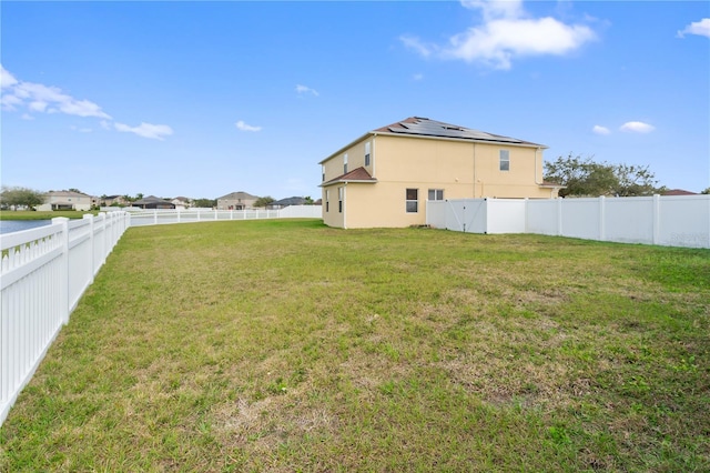 exterior space featuring a fenced backyard