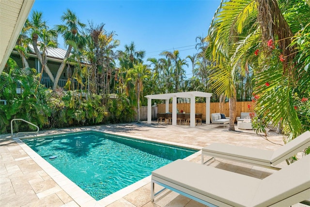 view of pool with a fenced in pool, a patio, an outdoor hangout area, a pergola, and a fenced backyard