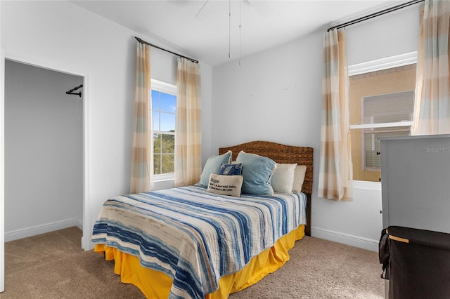 bedroom with carpet and baseboards