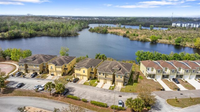 aerial view with a residential view and a water view