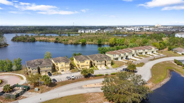 bird's eye view featuring a residential view and a water view