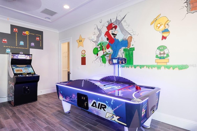 199 Macaulays Cv, Haines City, FL 33844 - playroom featuring crown molding, recessed lighting, wood finish floors, baseboards, and visible vents