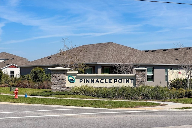 view of community sign