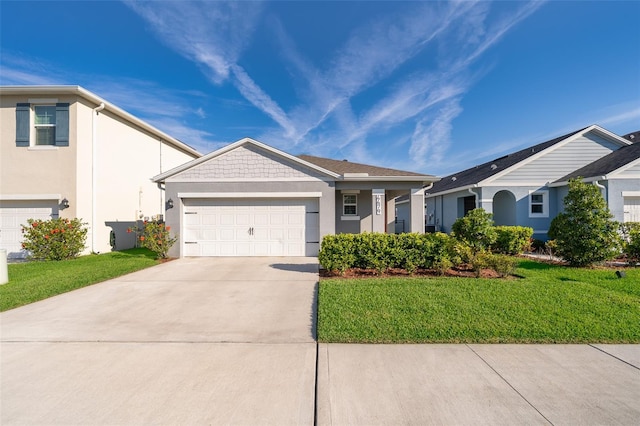 ranch-style house featuring a garage, a front lawn, concrete driveway, and stucco siding