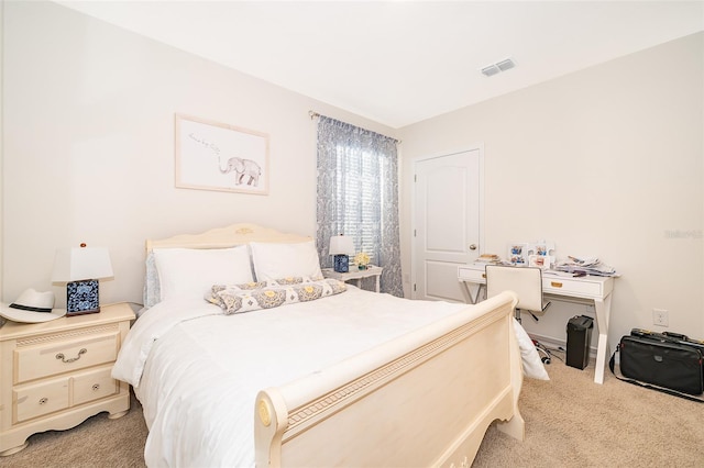 bedroom with light colored carpet and visible vents