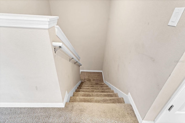 stairway with baseboards