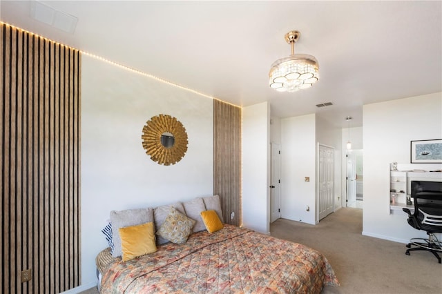 bedroom with carpet floors and visible vents