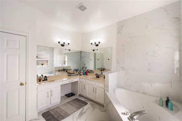 full bath with a sink, visible vents, marble finish floor, a jetted tub, and double vanity