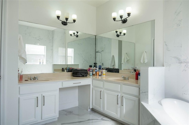 full bath with double vanity, marble finish floor, a washtub, and a sink