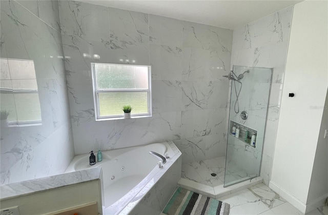 4301 Presidio Way, Kissimmee, FL 34746 - bathroom featuring marble look tiles, a jetted tub, and a marble finish shower