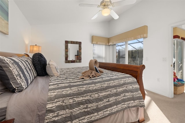 bedroom with access to exterior, carpet, lofted ceiling, a ceiling fan, and baseboards