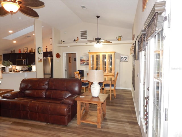 living room featuring high vaulted ceiling, recessed lighting, wood finished floors, a ceiling fan, and visible vents