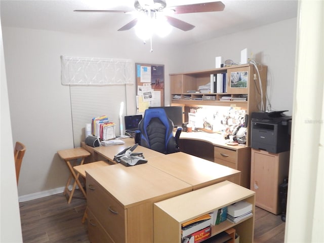 office space featuring ceiling fan, wood finished floors, and baseboards