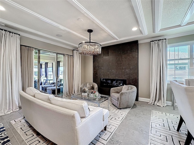 living area featuring recessed lighting, crown molding, baseboards, and an inviting chandelier