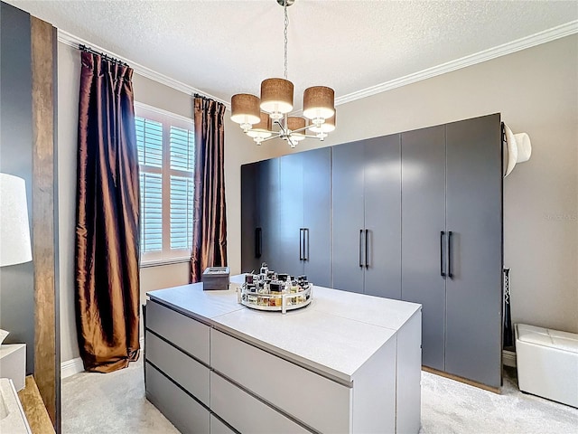 walk in closet featuring light carpet and a notable chandelier