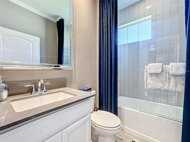 bathroom with a textured wall, vanity, toilet, and shower / bath combo with shower curtain