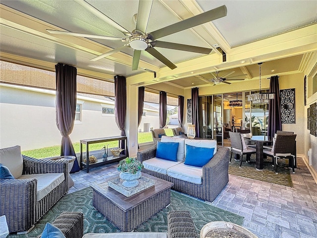 view of patio / terrace featuring a ceiling fan and an outdoor living space