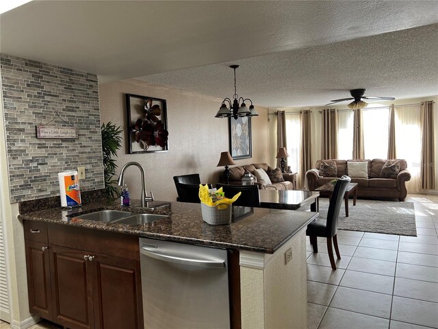 2494 Sweetwater Club Cir Unit 55, Kissimmee, FL 34746 - kitchen featuring open floor plan, light tile patterned flooring, a sink, and dishwasher