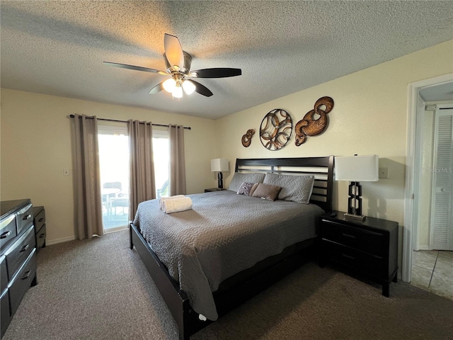 2494 Sweetwater Club Cir Unit 55, Kissimmee, FL 34746 - carpeted bedroom with ceiling fan and a textured ceiling