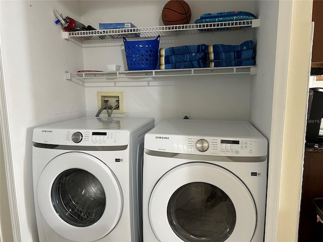 2494 Sweetwater Club Cir Unit 55, Kissimmee, FL 34746 - laundry room featuring laundry area and independent washer and dryer