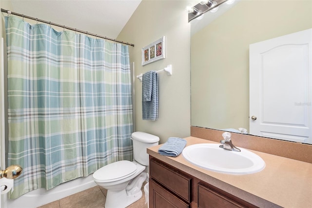 full bath with toilet, tile patterned flooring, shower / bath combo, and vanity